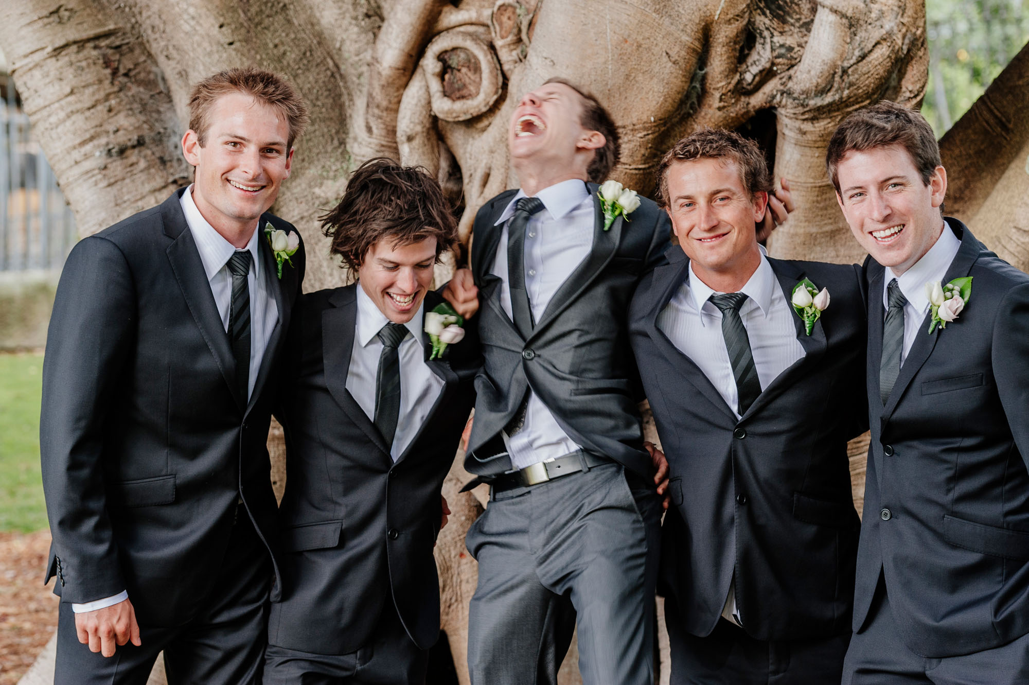 Groom reacting to being tickled