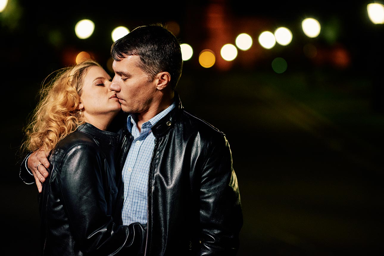 Night engagement photos in leather jackets