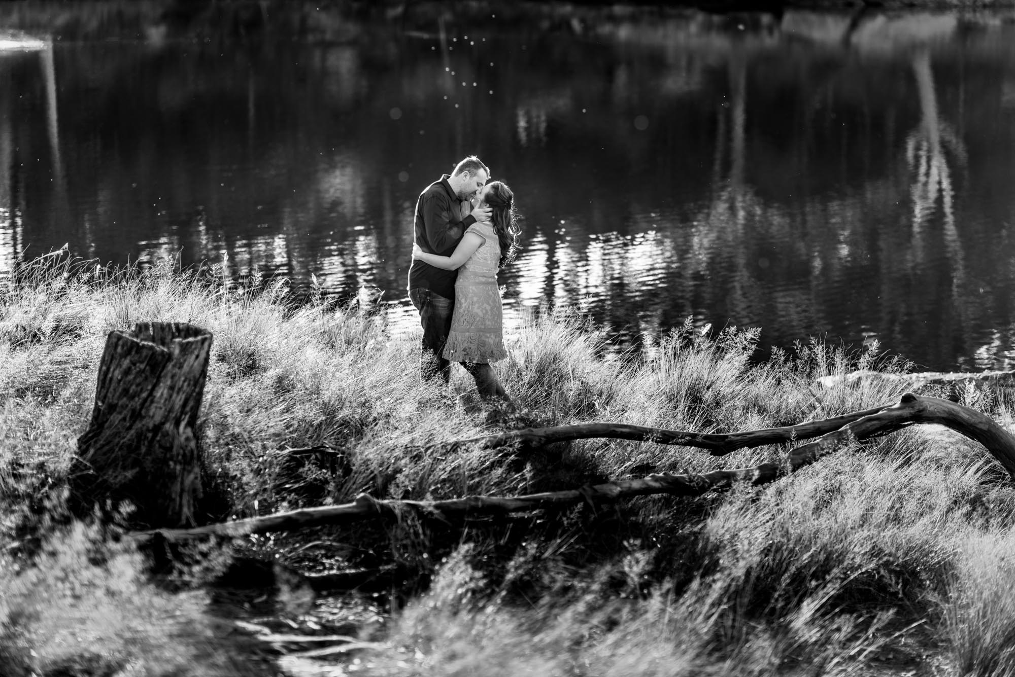 black and white engagement photo at Lake Parramatta of Neil and Emma