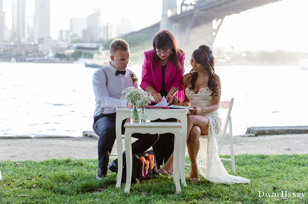 Signing the wedding register at Captain Henry Waterhouse Reserve