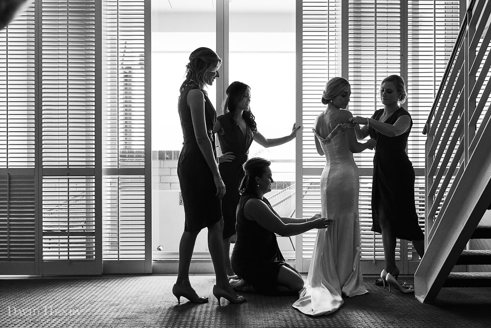 Bride getting dressed at Watsons Bay Hotel