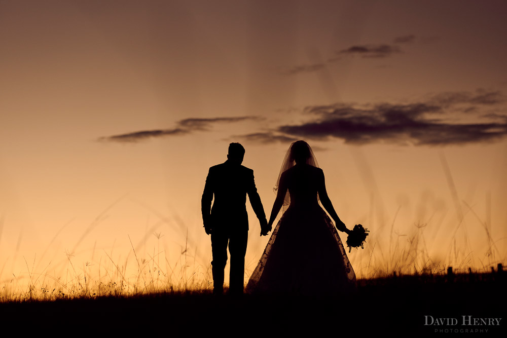 Silhouette of bride and groom at Ironbark Hill