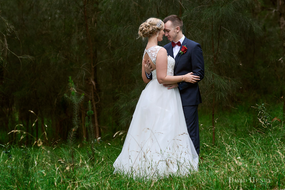 Bride and groom in quiet moment in Sydney bush