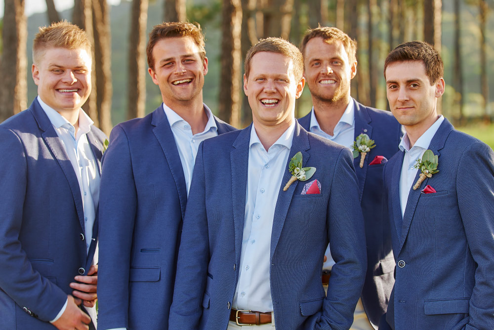 groom and mates laughing together