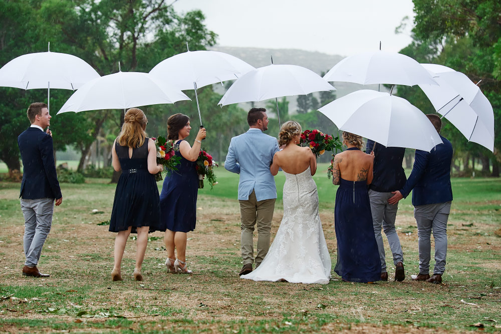 Bridal party in the rain