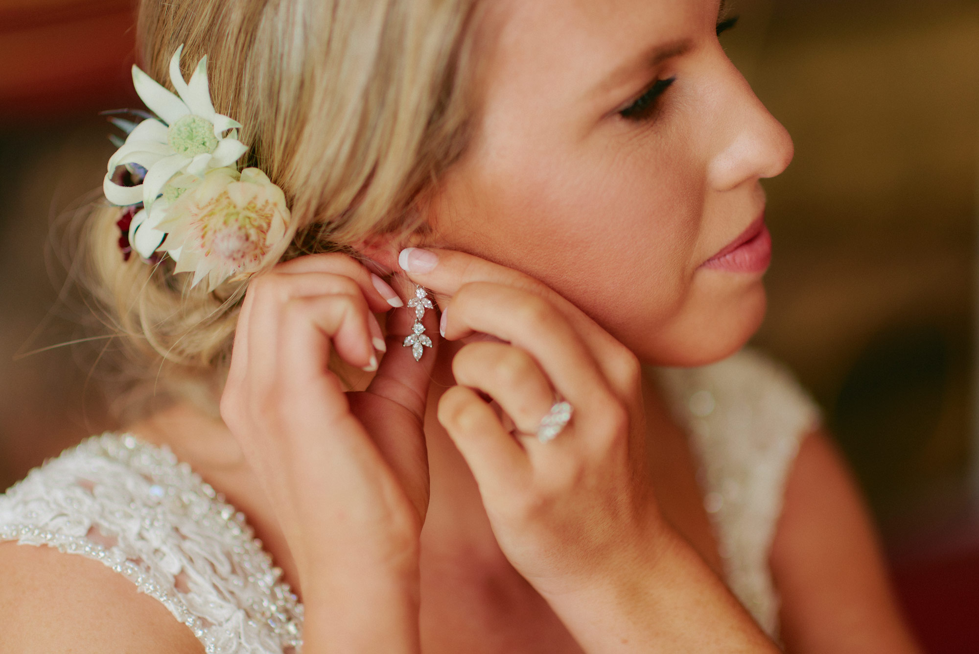 The bride putting in her earrings