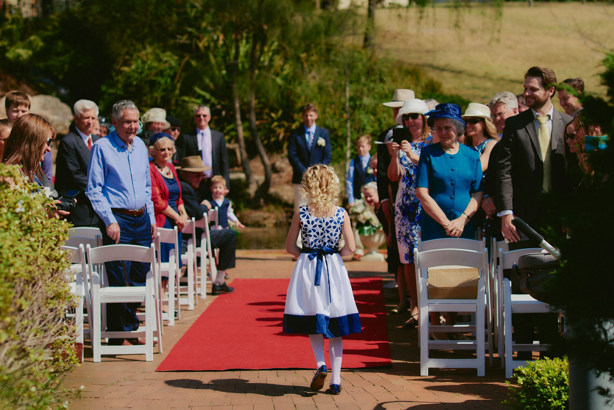 Bridesmaid walking down aisle at Fairmont Resort wedding