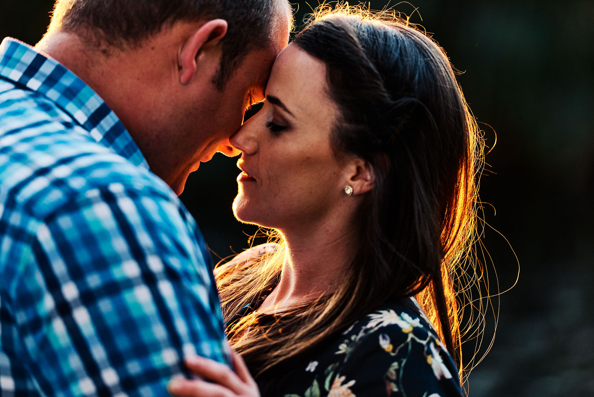 Close embrace of James and Moira during the Engagement Session at Centennial Parklands