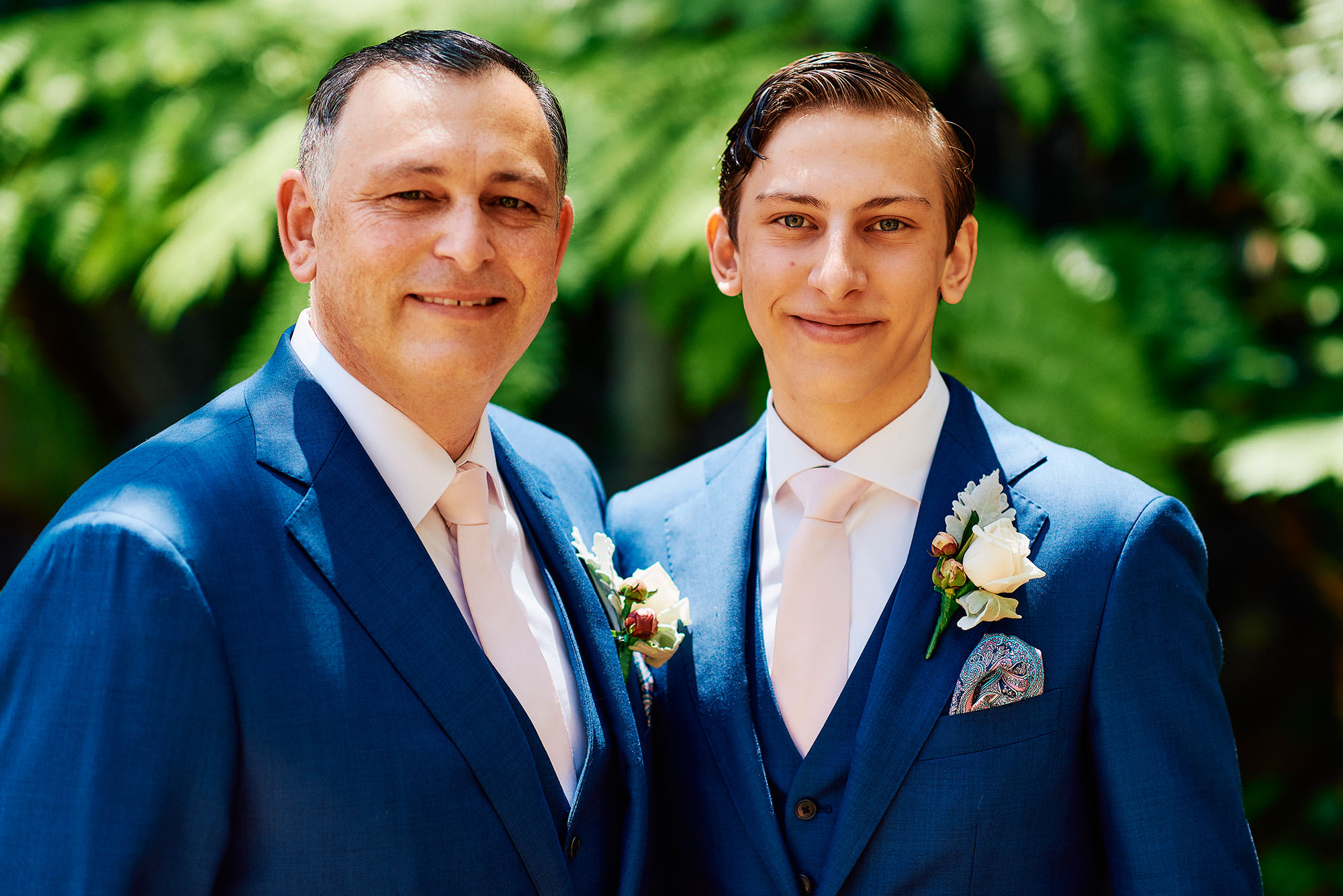 Groom and his best man son on wedding day