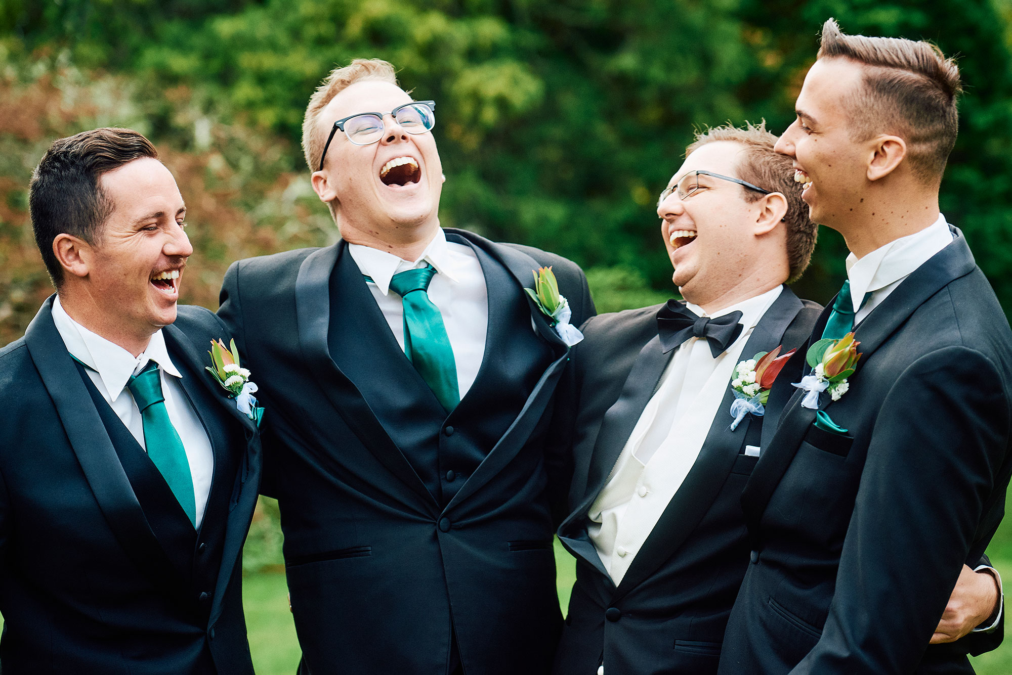 Laughing groomsmen