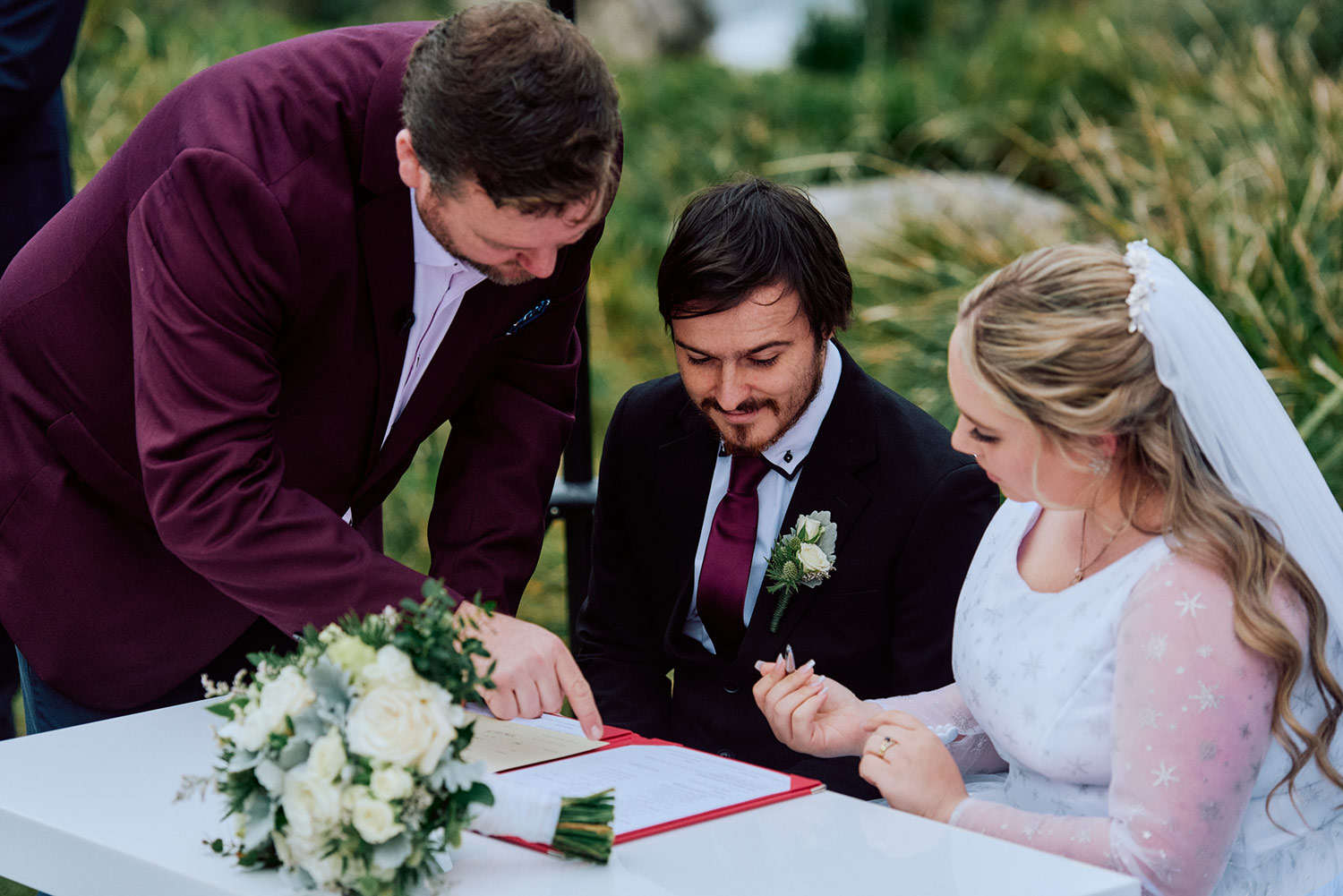 Signing the wedding register at Q Station