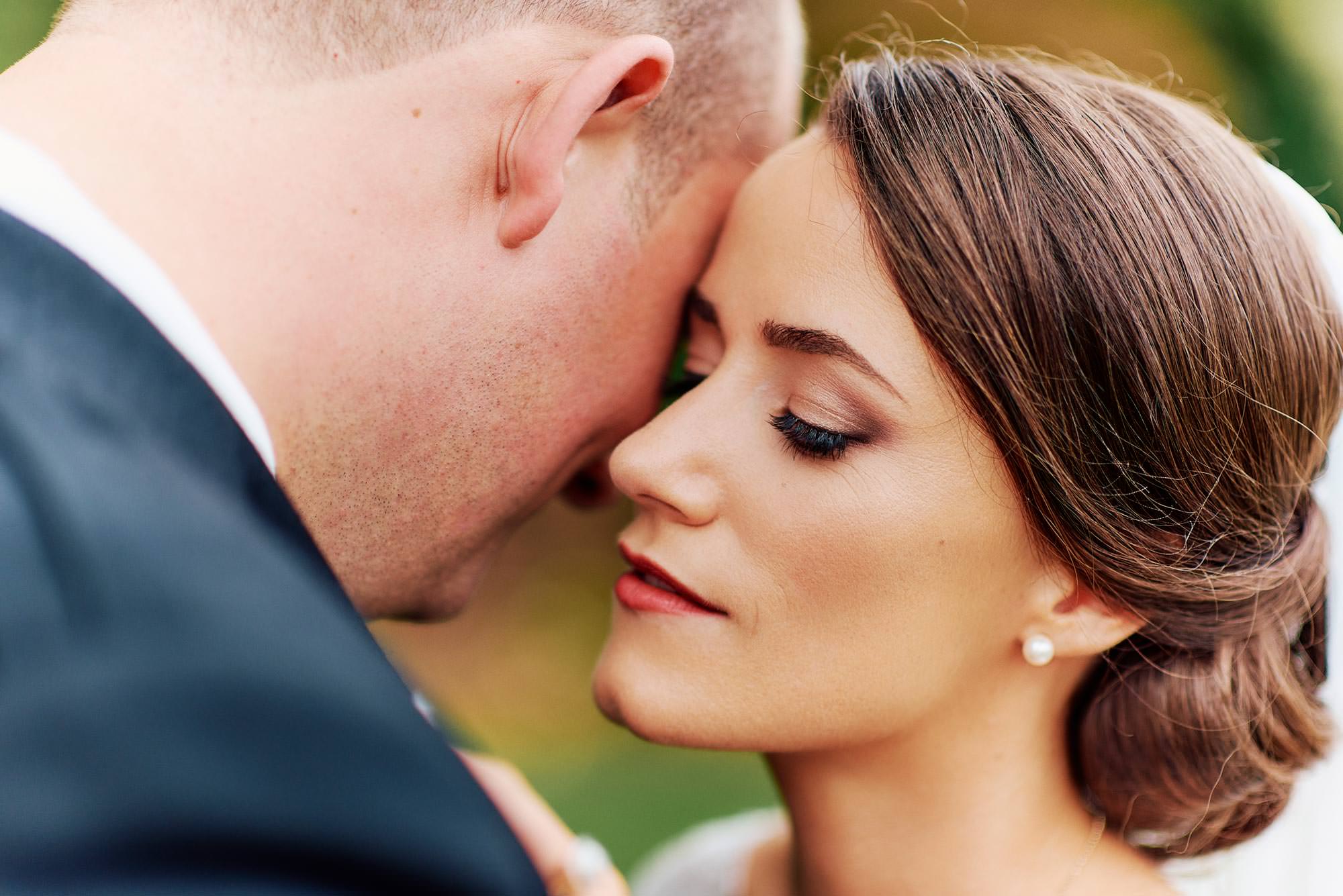 Bride and groom close embrace during Peppers Craigieburn wedding