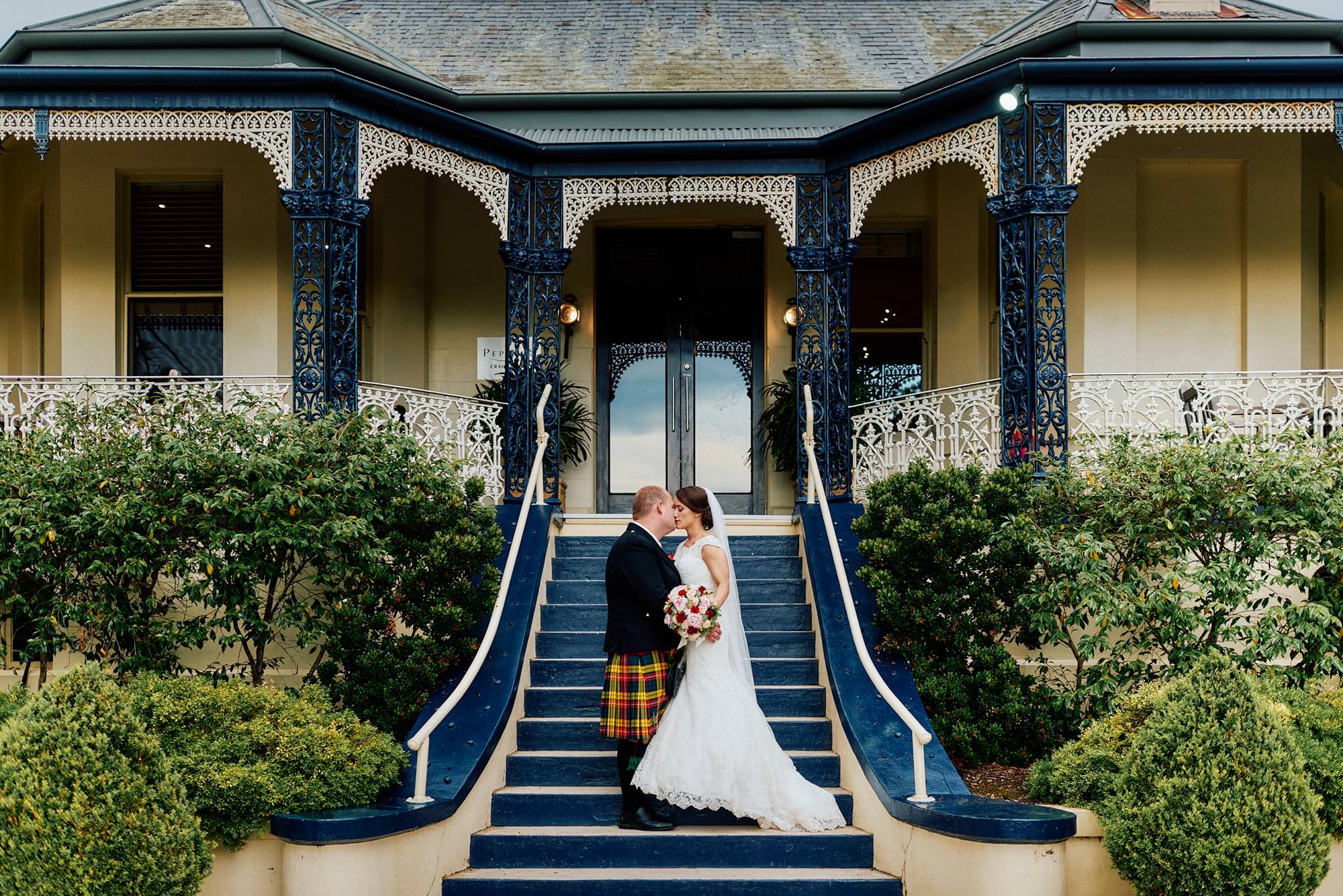 Wedding photos on the steps of Peppers Craigieburn
