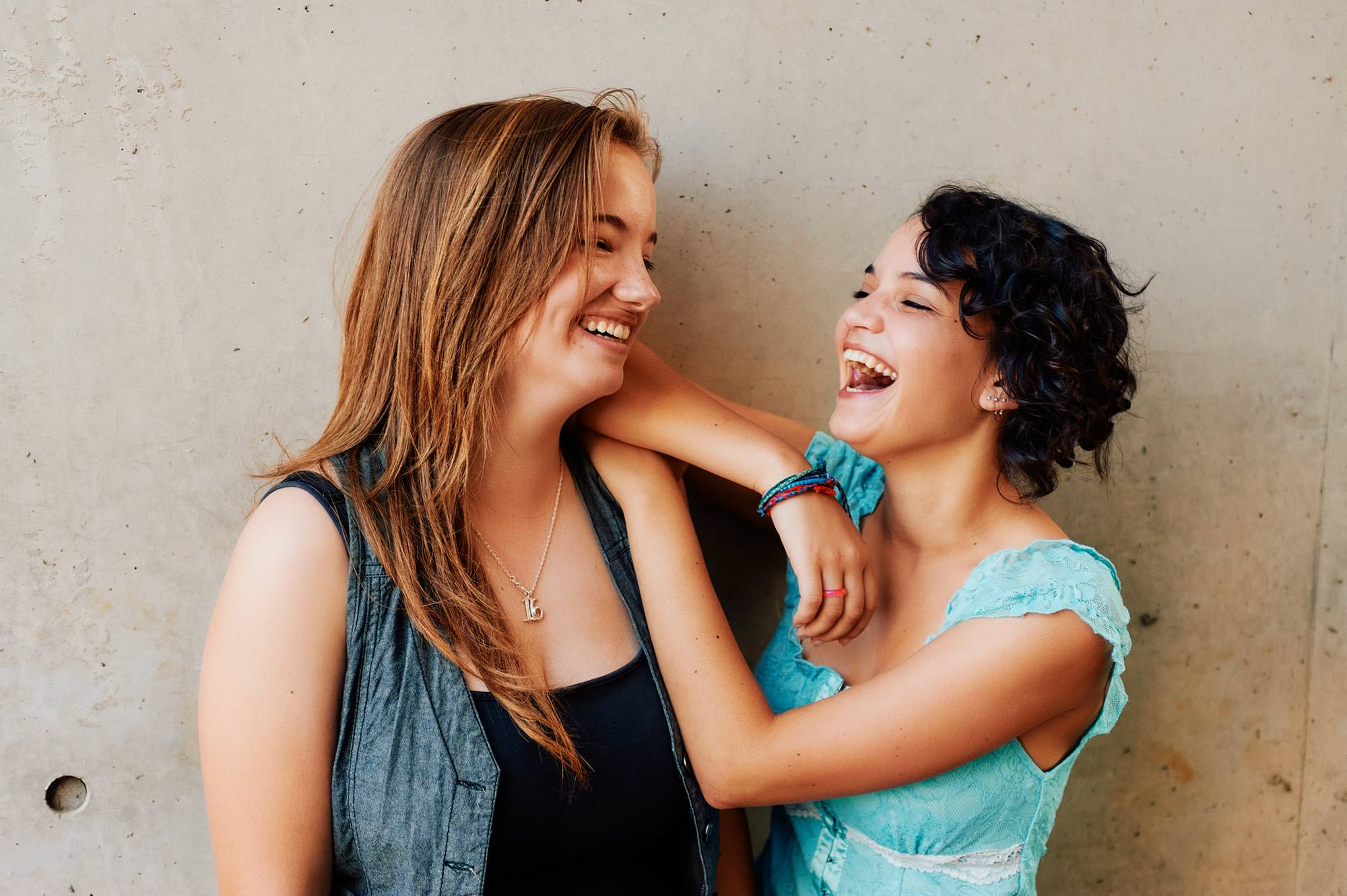 Friends laughing together during their Homebush portrait session