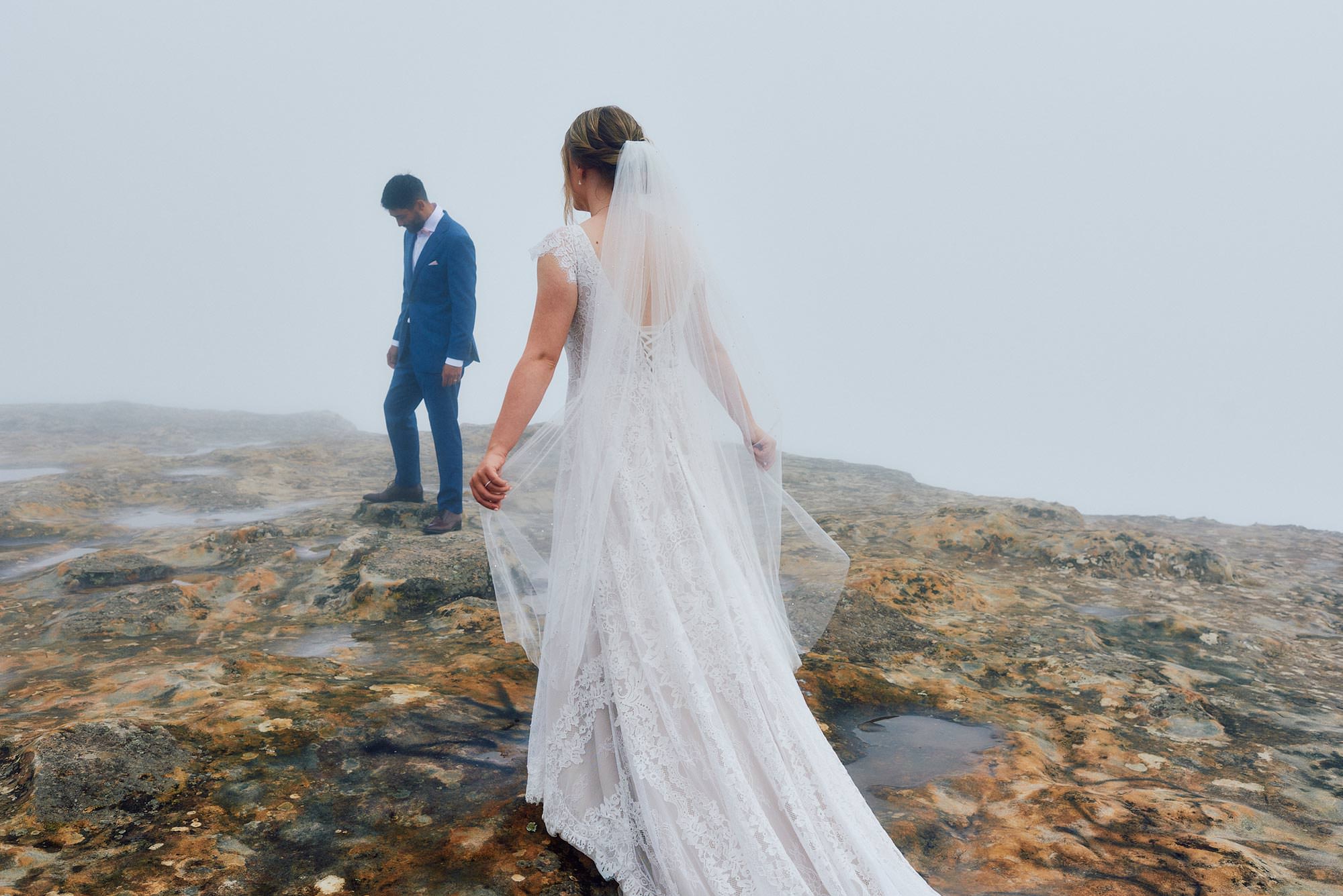 Bride and groom in the mist