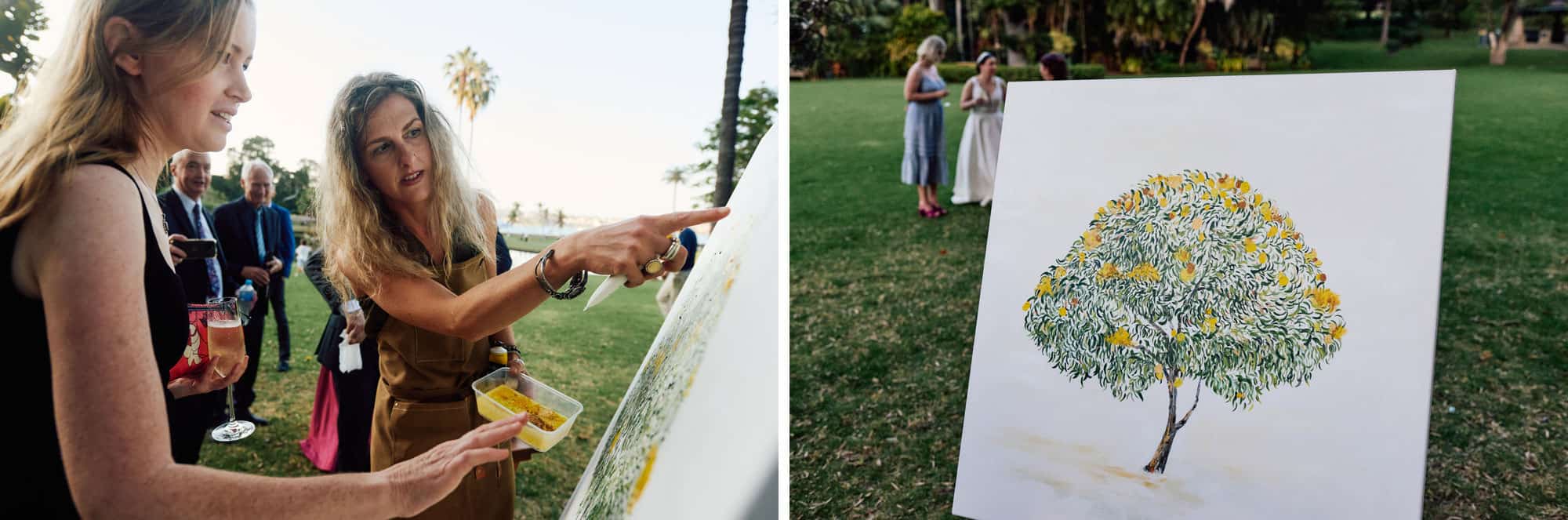 Artist with wedding painting of tree of guests fingerprints