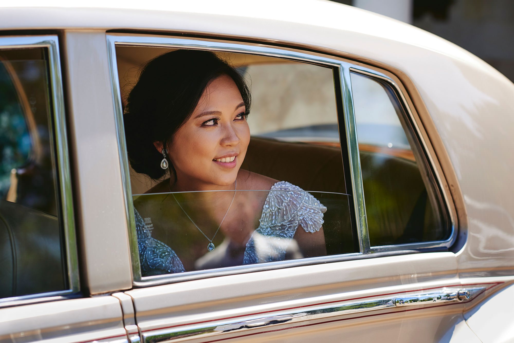 Vivian in wedding car