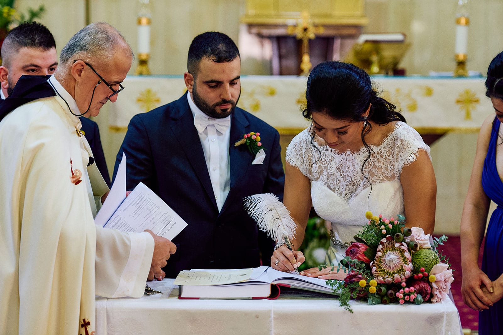 Signing the register at St Charbel